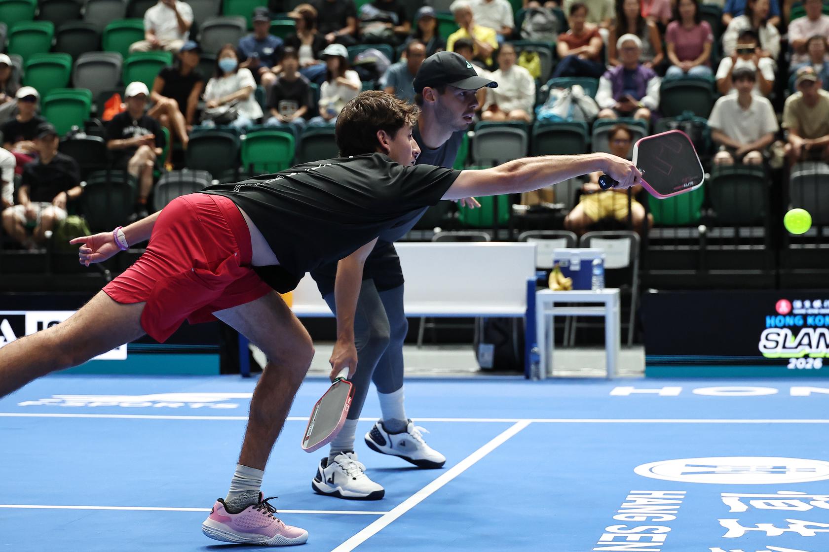 Gabriel Tardio lunges for a ball at Kai Tak